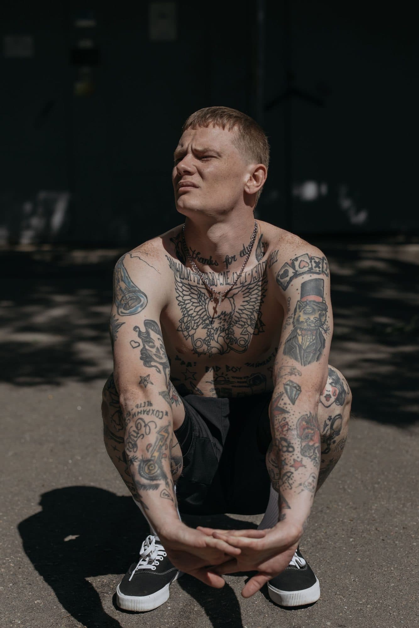 Man with flash tattoos on his arms and chest